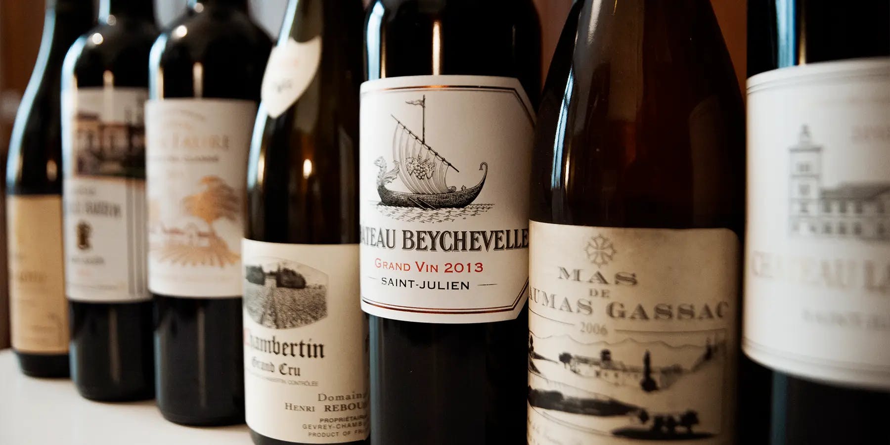 Various bottles of Bordeaux and Burgundy